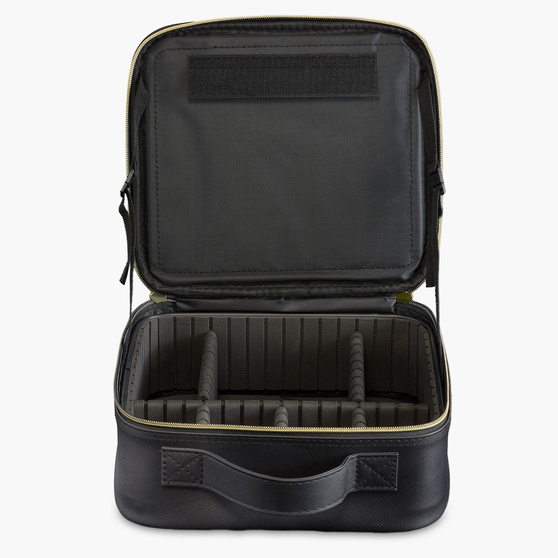 Open travel makeup bag with multiple compartments for organizing cosmetics and brushes.